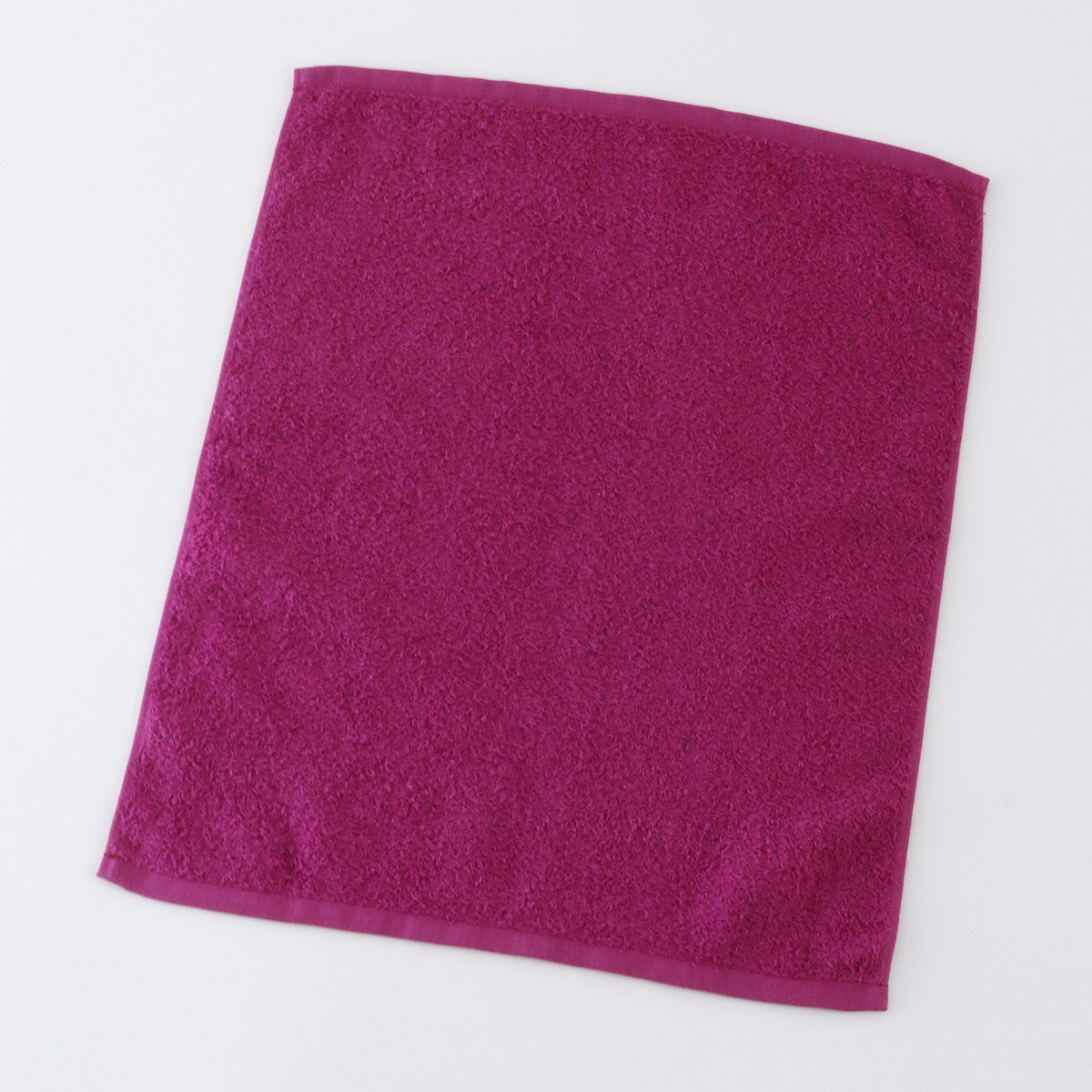 Oboro Towel Japanese Traditional Colours guest towel in Botan (Peony Pink)