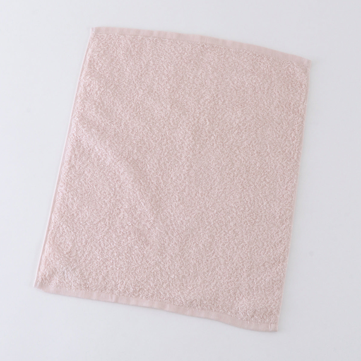 Oboro Towel Japanese Traditional Colours guest towel in Sakura (Pale Pink)