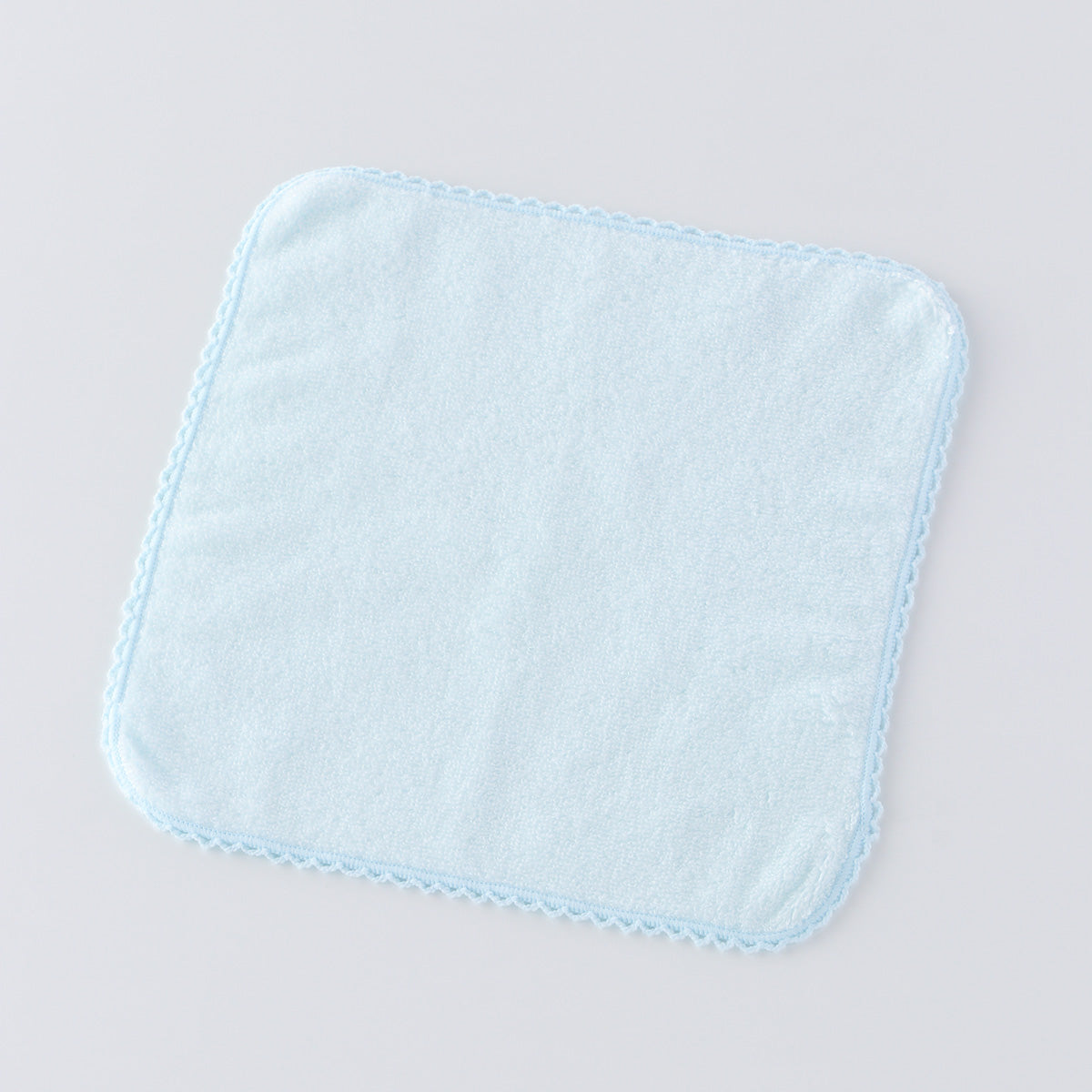 Fuwafuwa Color towel handkerchief in Blue