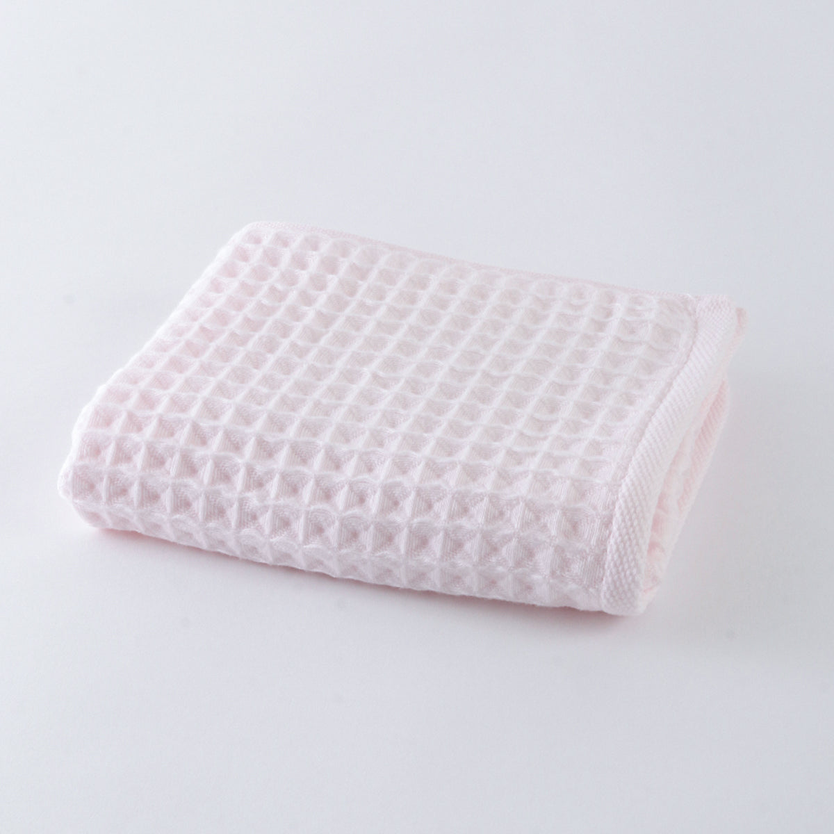 Air Waffle face towel in Pink