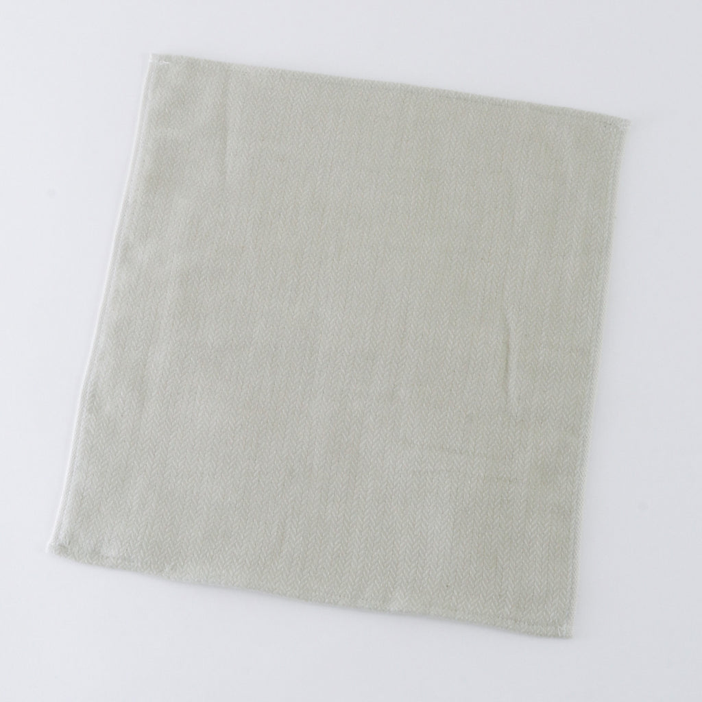 Tea-dyed organic gauze guest towel in Green