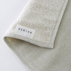 Tea-dyed organic gauze guest towel in Green
