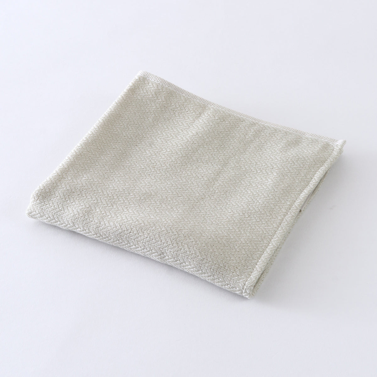 Tea-dyed organic gauze guest towel in Green