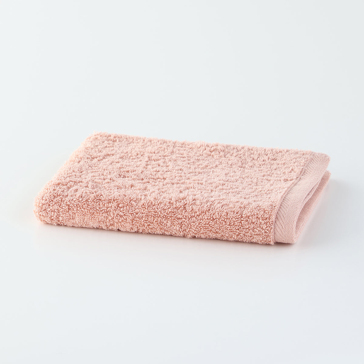 Plant-dyed Organic Pile guest towel in Pink