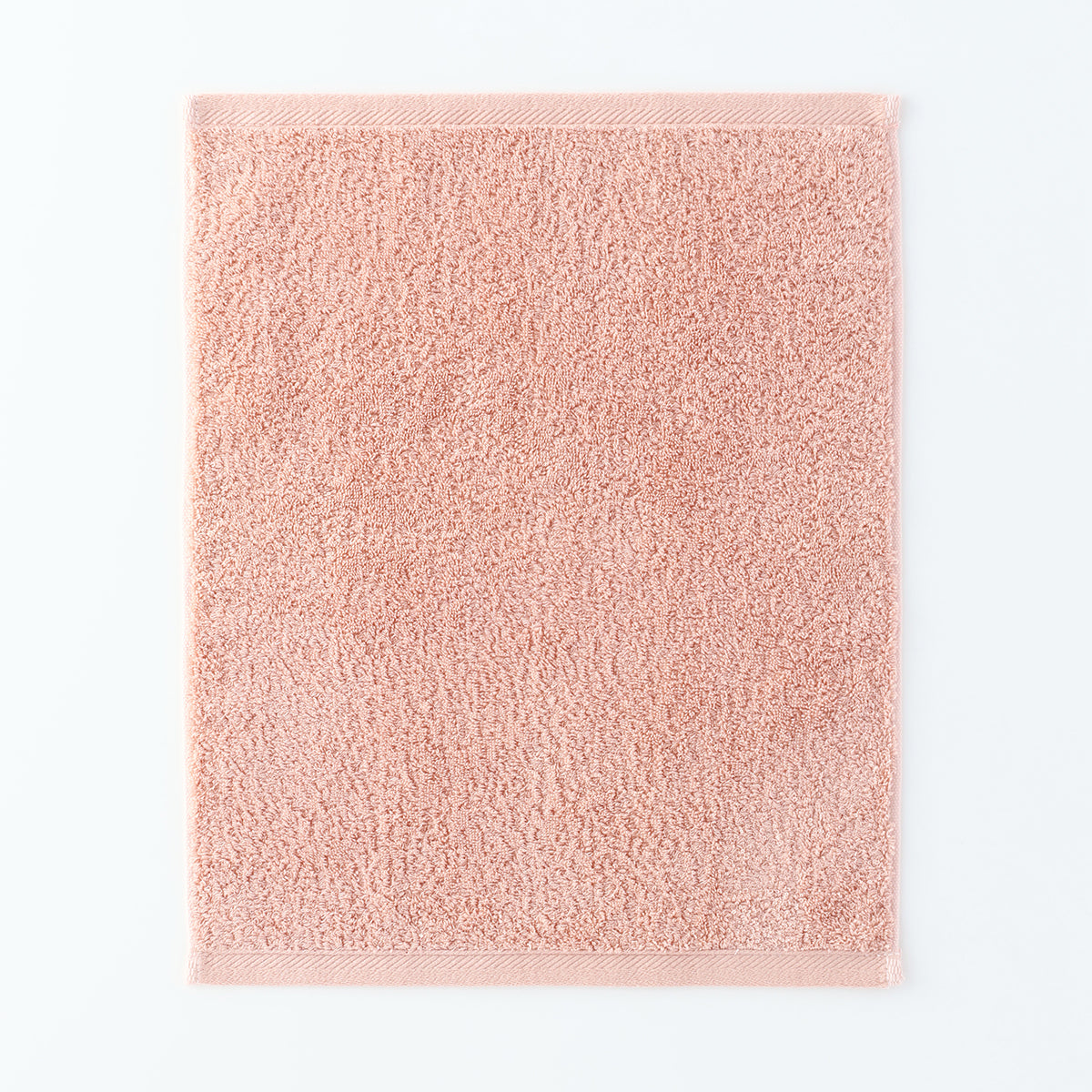 Plant-dyed Organic Pile guest towel in Pink