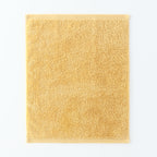 Plant-dyed Organic Pile guest towel in Yellow