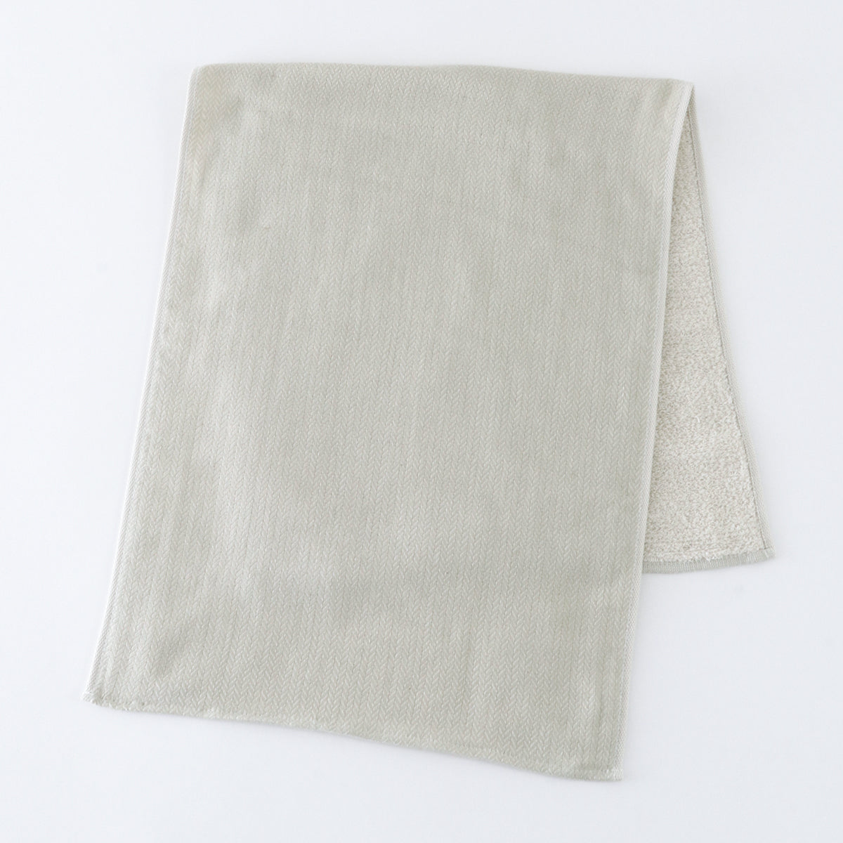 Tea-dyed organic gauze face towel in Green