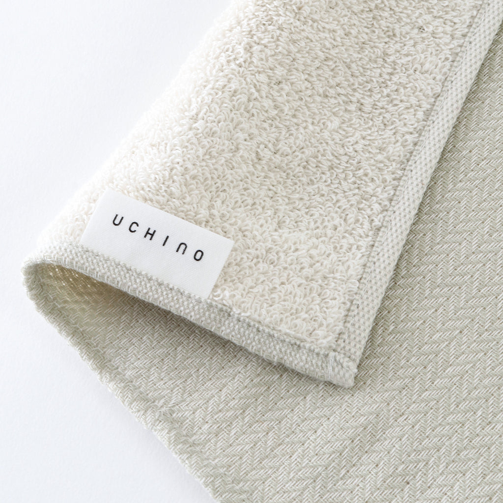 Tea-dyed organic gauze face towel in Green