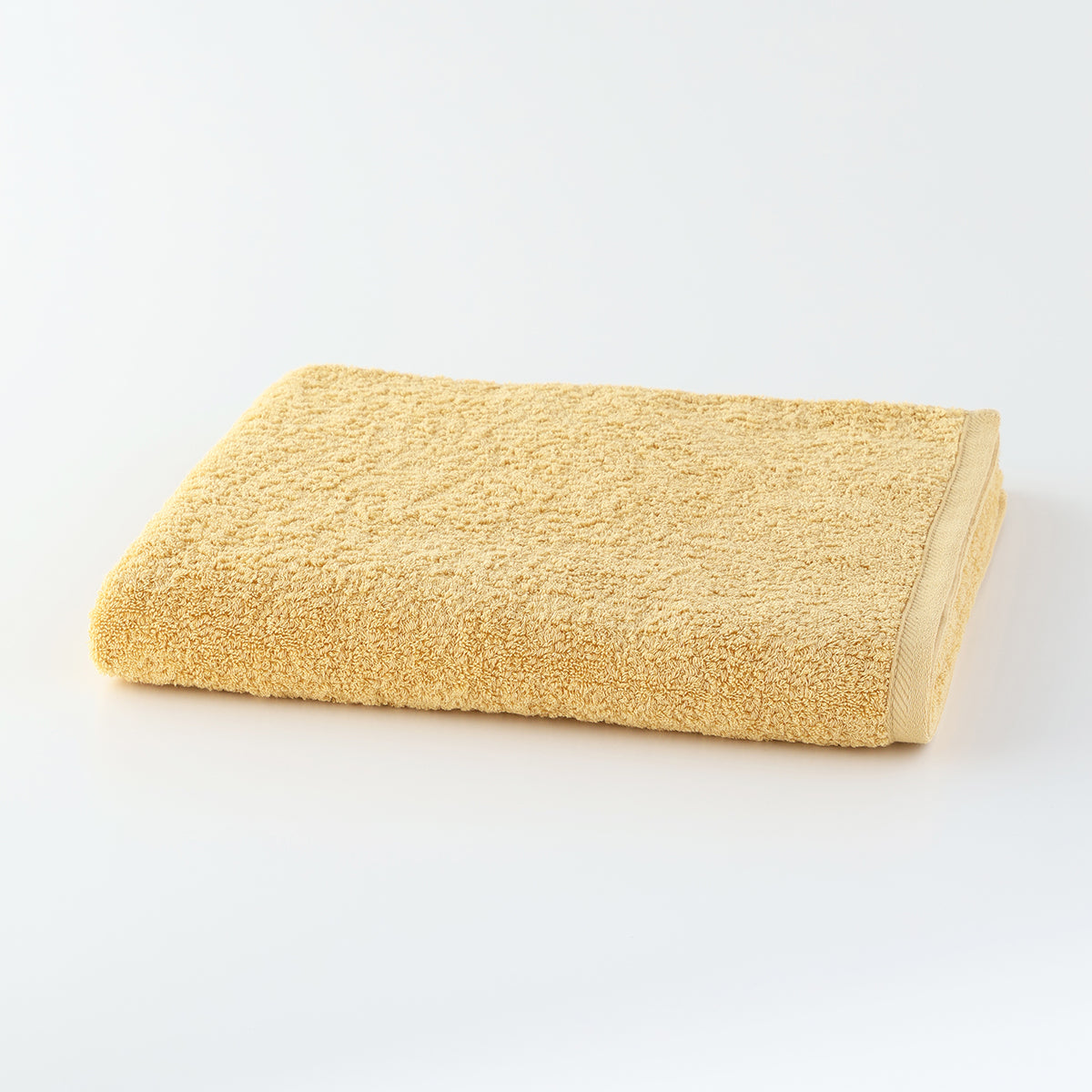 Plant-dyed Organic Pile bath towel in Yellow