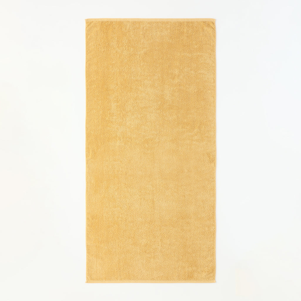 Plant-dyed Organic Pile bath towel in Yellow