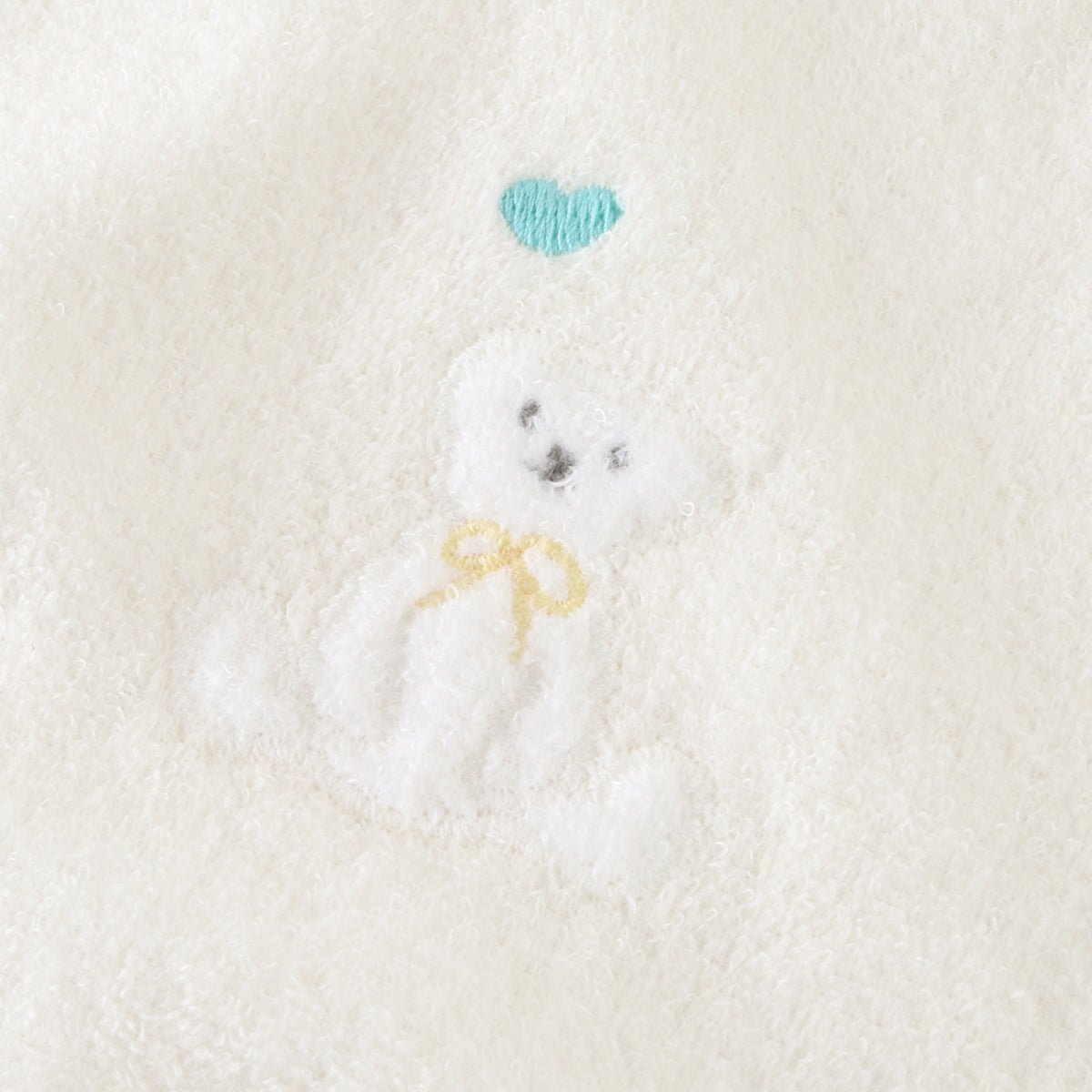 Airy Touch fluffy baby bib in Ivory