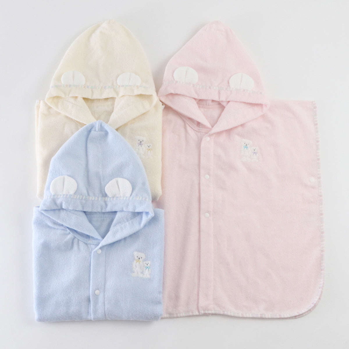 Airy Touch baby poncho in Blue