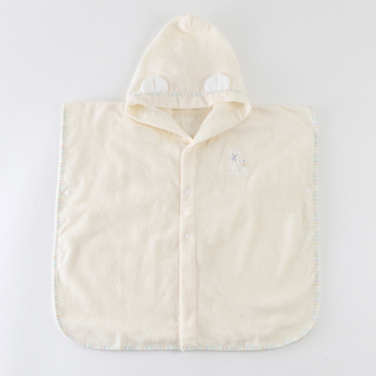 Airy Touch baby poncho in Ivory