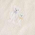 Airy Touch baby poncho in Ivory