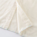 Airy Touch baby poncho in Ivory