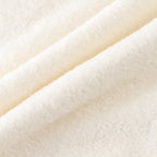 Airy Touch baby poncho in Ivory