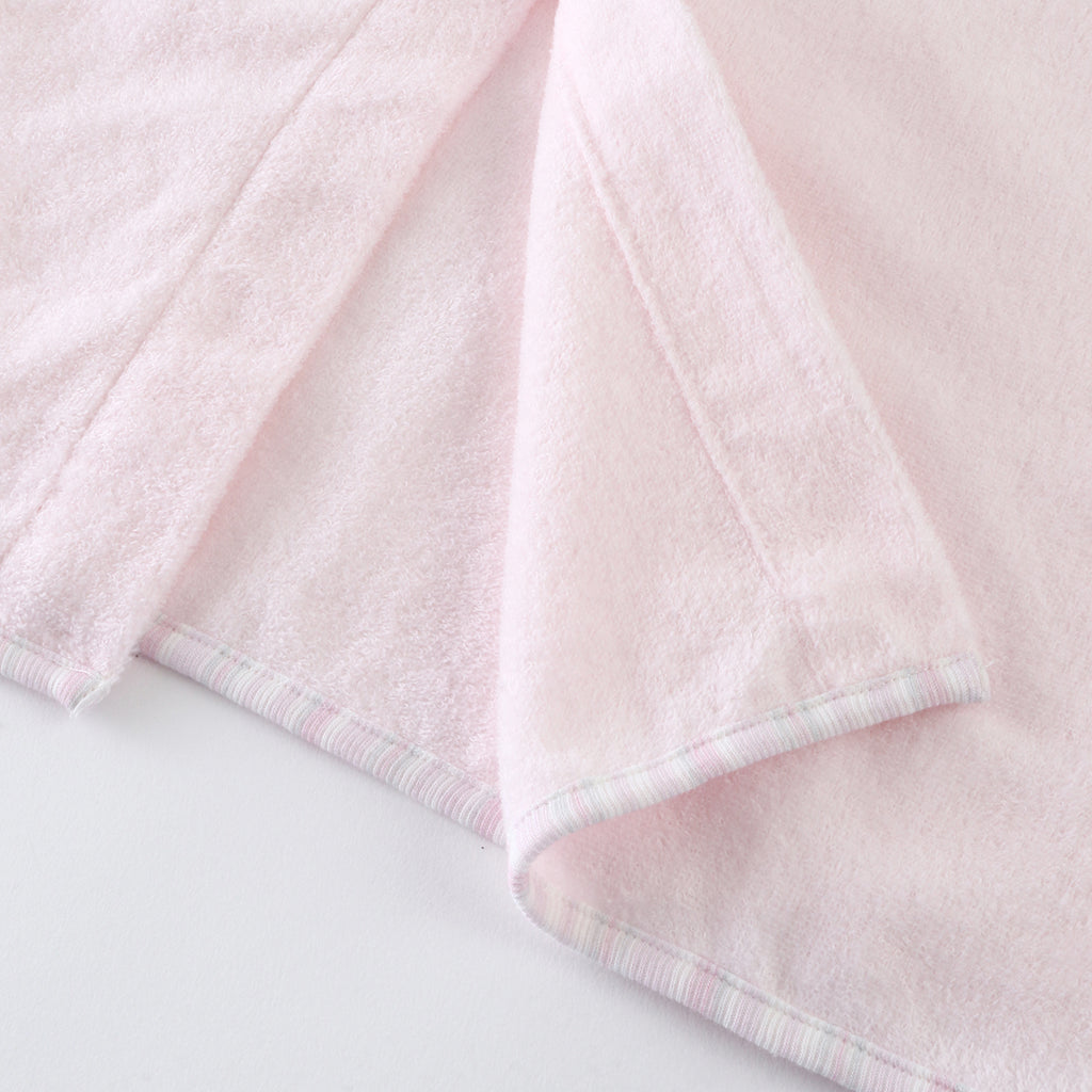 Airy Touch baby poncho in Pink