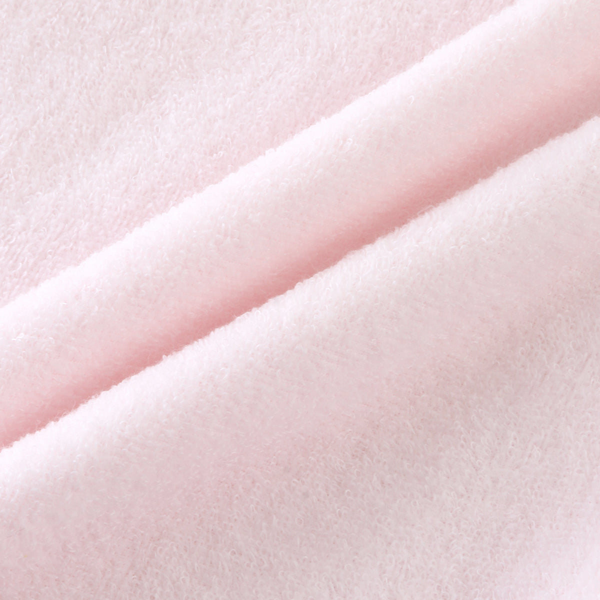 Airy Touch baby poncho in Pink